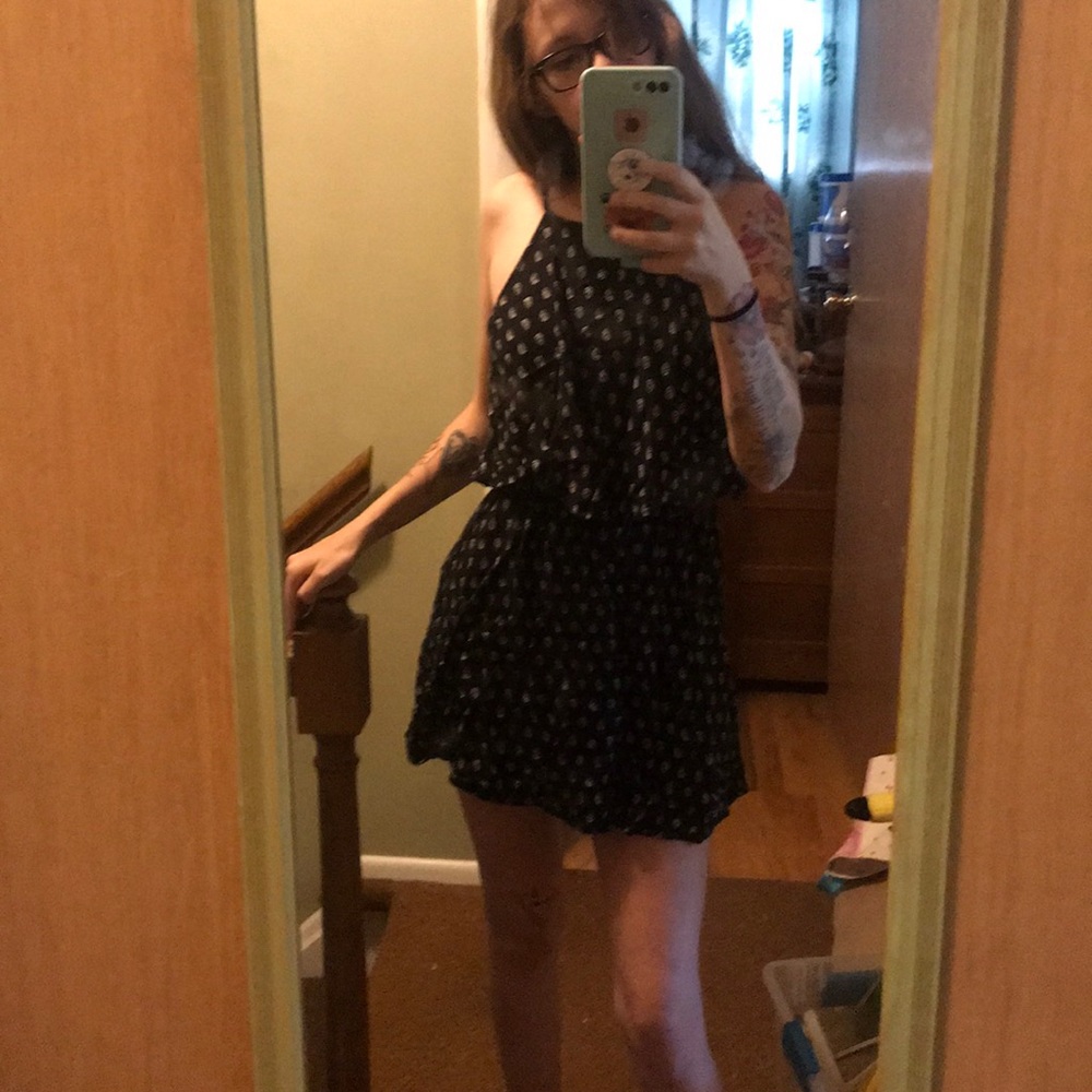 Black and white patterned dress with ruffle chest